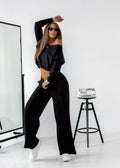 Czarny komplet damski crop top i szerokie spodnie – styl casual premium
