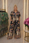Elegancki zestaw damski plus size czarny w kwiaty – koszula i szerokie spodnie premium