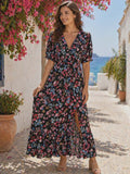 Długa sukienka maxi w kwiaty na czarnym tle, damska, lekka i zwiewna, styl boho na lato