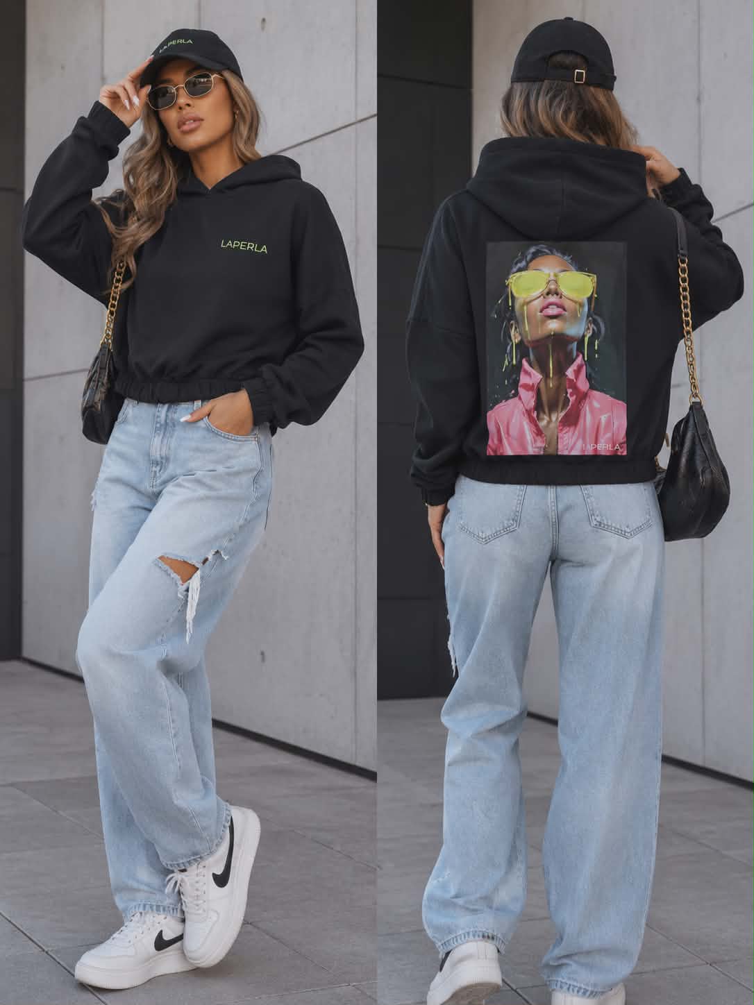 Modna czarna bluza damska La Perla z kapturem i efektownym nadrukiem na plecach, zestawiona z jasnymi jeansami w stylu streetwear.