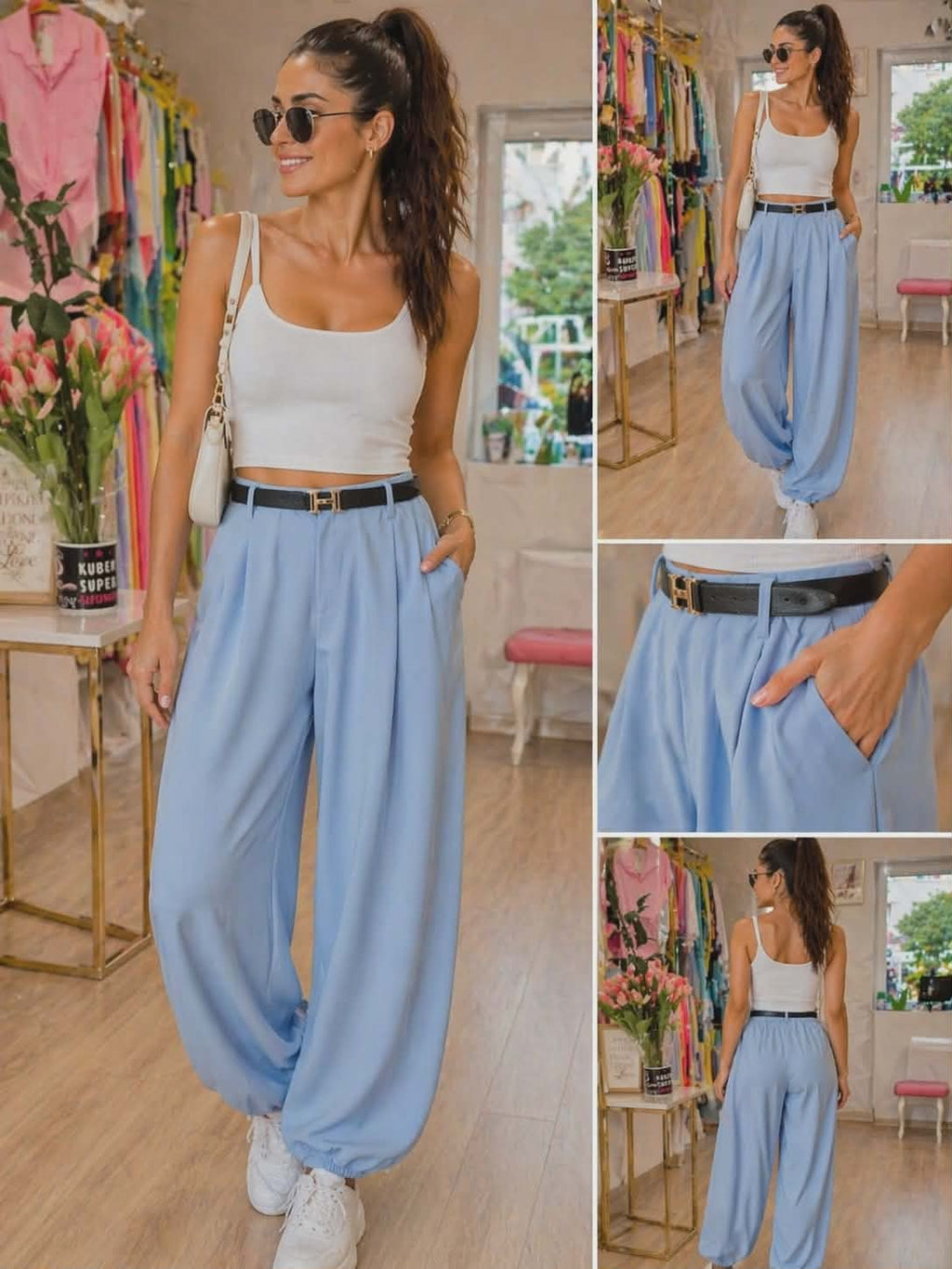 Stylowe spodnie damskie Hermes z paskiem w kolorze niebieskim, luźny krój, wysoki stan, elegancki i komfortowy look na co dzień