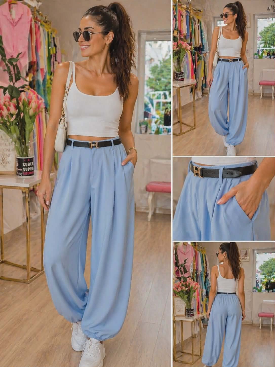 Stylowe spodnie damskie Hermes z paskiem w kolorze niebieskim, luźny krój, wysoki stan, elegancki i komfortowy look na co dzień
