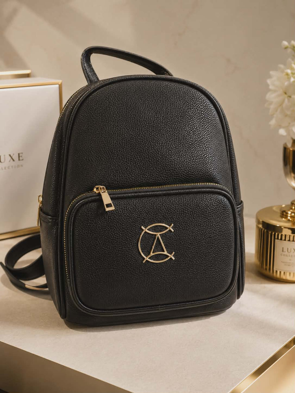 Elegancki czarny plecak damski premium z minimalistycznym designem i złotymi detalami idealny na co dzień, do pracy i na wyjazdy